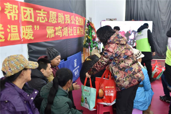 2月16日九三学社绿园区委慰问贫困残疾人家庭——摄影安璨颖.jpg
